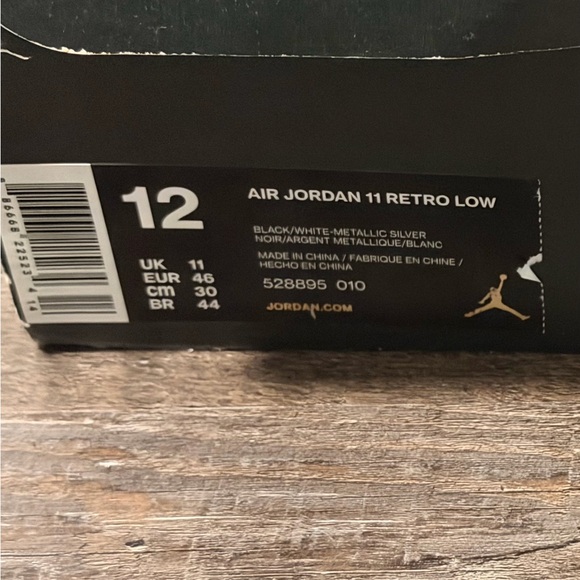 Jordan Retro Low Black, White, and Silver Sneakers - Picture 3 of 6